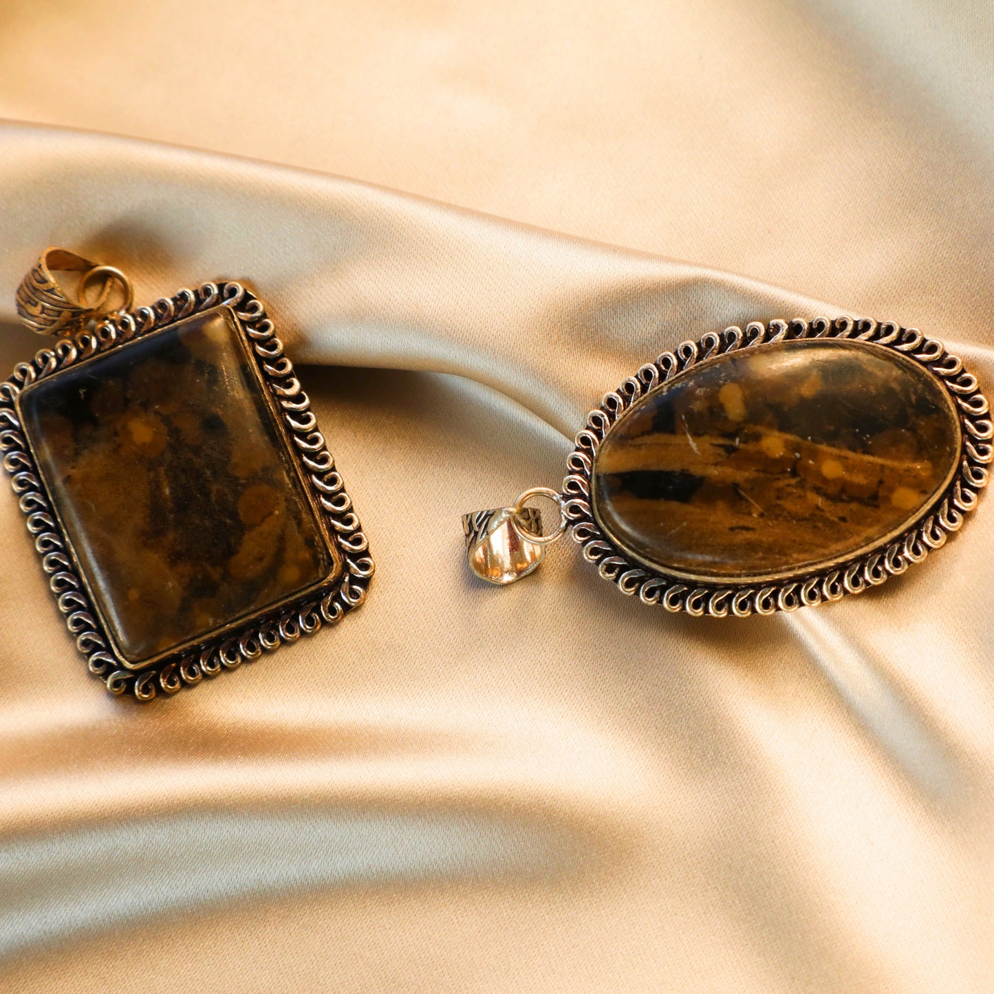 Net Black Jasper crystal with deep black color and unique net-like patterns, symbolizing protection, grounding, and emotional strength. Ideal for Root Chakra balancing.