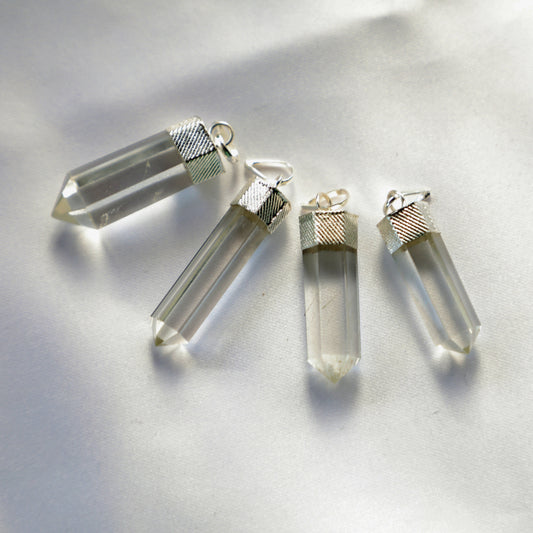 Natural, Clear Quartz crystal known for energy amplification, clarity, and healing