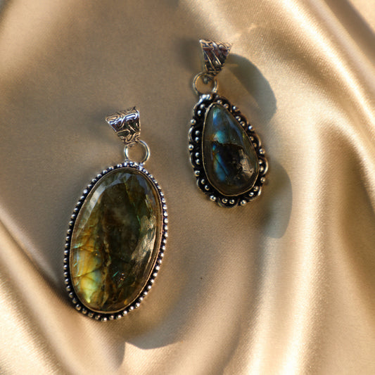 Labradorite crystal with iridescent flashes of blue, green, and gold, symbolizing transformation, intuition, and protection. Ideal for Throat and Third Eye Chakra work.