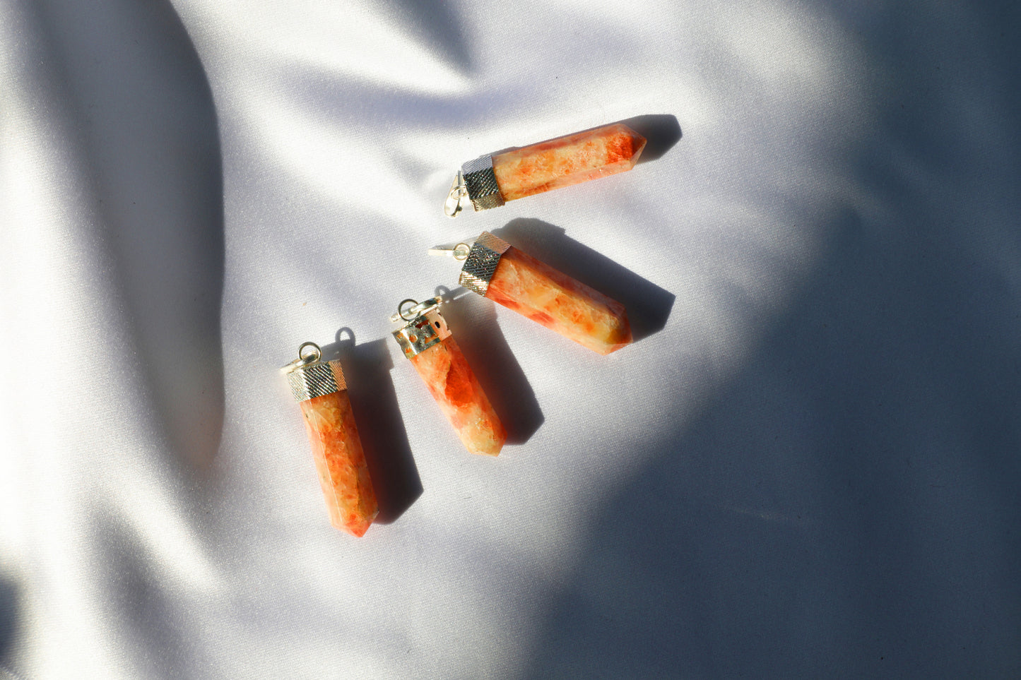Sunstone crystal with golden-orange shimmer symbolizing joy, vitality, and personal empowerment — ideal for boosting confidence and emotional healing.
