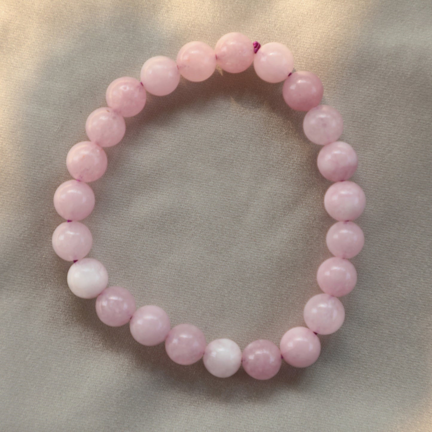 Soft pink Rose Quartz crystal symbolizing unconditional love, emotional healing, and heart-centered energy.