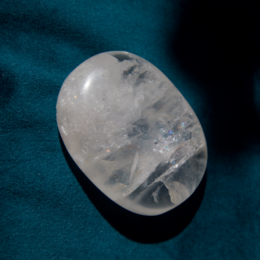A luminous Clear Quartz crystal with a transparent, radiant appearance, symbolizing clarity, healing, and energetic amplification. Ideal for enhancing intention, balance, and spiritual connection.