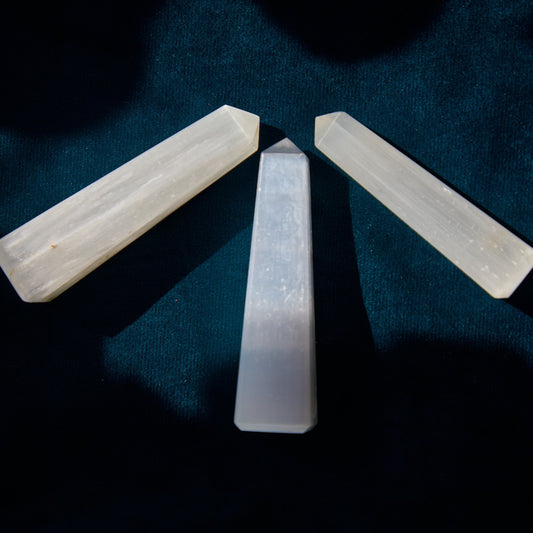Selenite crystal with a translucent, ethereal appearance, known for promoting clarity, purification, and spiritual connection. Ideal for Crown Chakra work.