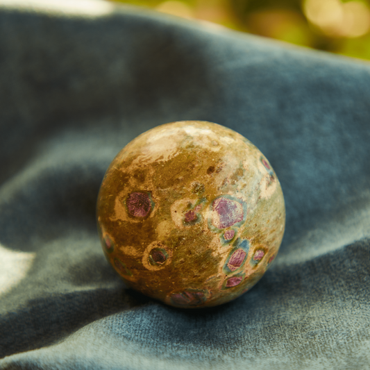 Ruby Fuchsite crystal combining red Ruby and green Fuchsite, symbolizing emotional healing, heart chakra energy, love, and courage