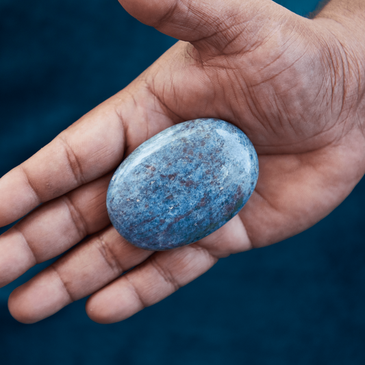 
uby Kyanite crystal with vivid deep reds and cool blue streaks, symbolizing a balance of passion and clarity. Ideal for energetic alignment, emotional empowerment, and clear communication.