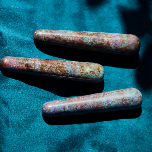 Ruby Kyanite crystal with vibrant red and blue hues symbolizing alignment, empowerment, and emotional clarity, used for chakra balancing and inner strength.
